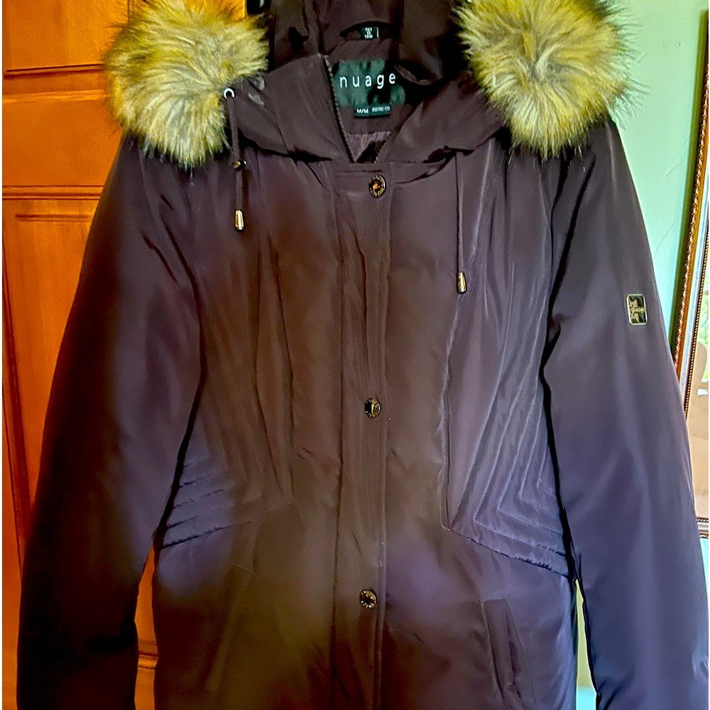 Eggplant color, knee length super warm winter down coat with faux fur hood.